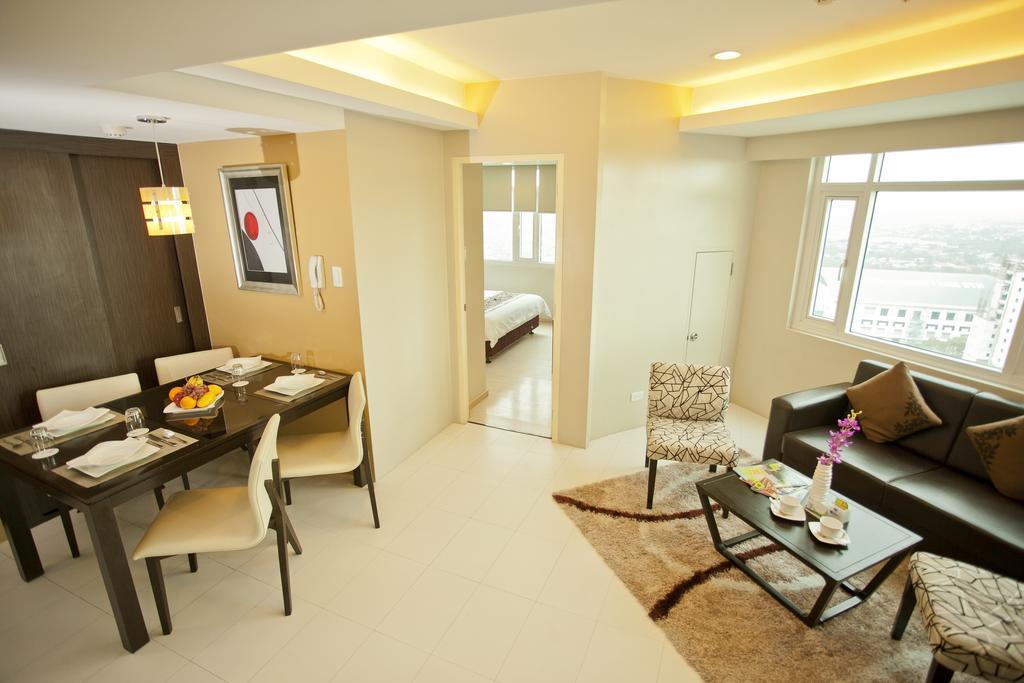 The Exchange Regency Residence Hotel Managed By Hii Pasig City Room photo