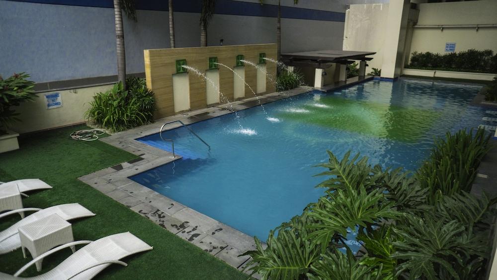 The Exchange Regency Residence Hotel Managed By Hii Pasig City Exterior photo