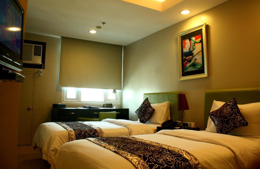 The Exchange Regency Residence Hotel Managed By Hii Pasig City Exterior photo